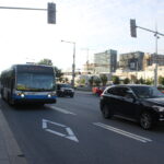 City bus traveling in a bus lane on Robert-Bourassa Boulevard in Montreal Quebec